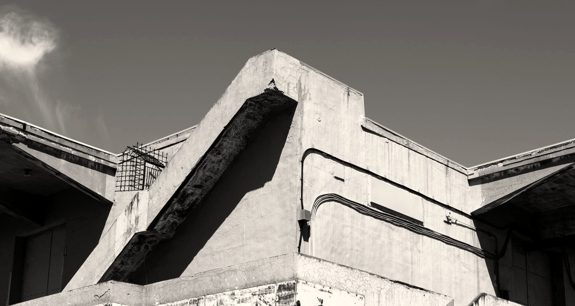 Concrete building structure photographed in black and white